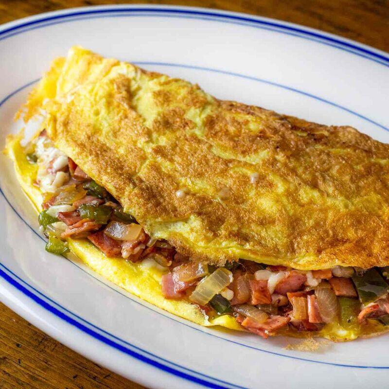 Omelette with Ham. Cheese. Peppers. and Onions